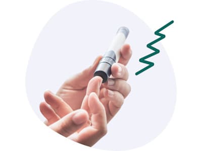 Hand, die eine Blutzuckermessung durchführt Hand, die eine Blutzuckermessung durchführt